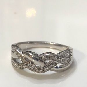 A diamond accent infinity ring on Sterling silver size 7